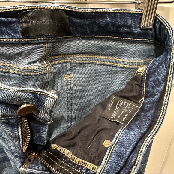 Buckle Blue Skinny Jeans with Faded Denim Look - Picture 4 of 5